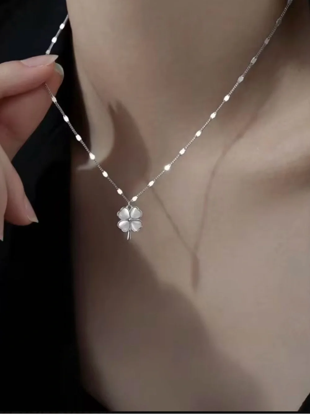 silver-tone four-leaf clover necklace white, pearlescent pendant shimmery chain